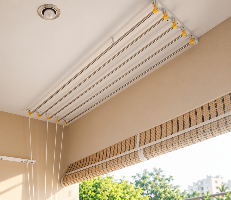 Modern steel ceiling-mounted cloth drying rack installed on a balcony